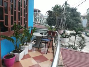 Un balcon sau o terasă la Nhà Nghỉ Đại Dương tắm khoáng nóng Mỹ Lâm