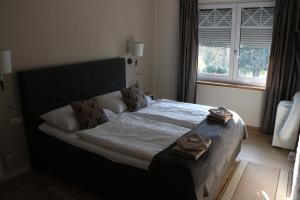 Łóżko lub łóżka w pokoju w obiekcie Pension Wachau