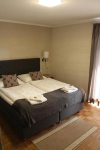 Łóżko lub łóżka w pokoju w obiekcie Pension Wachau