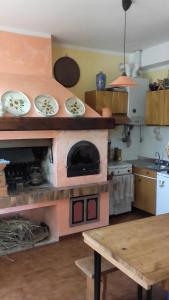 Кухня или мини-кухня в B&B Al Mutpron
