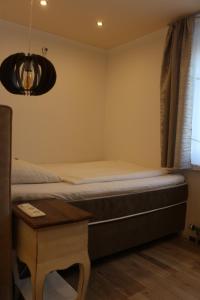 Łóżko lub łóżka w pokoju w obiekcie Pension Wachau
