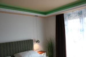 Łóżko lub łóżka w pokoju w obiekcie Pension Wachau