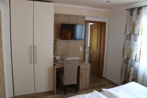Telewizja i/lub zestaw kina domowego w obiekcie Pension Wachau