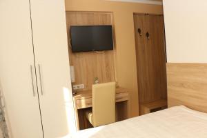 Telewizja i/lub zestaw kina domowego w obiekcie Pension Wachau