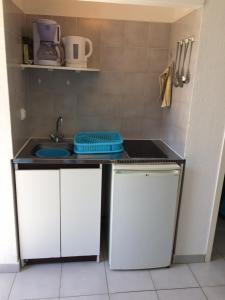 Kuchyň nebo kuchyňský kout v ubytování Residence Motel Corsicana
