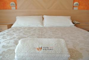 Cama ou camas em um quarto em Hotel Bologna
