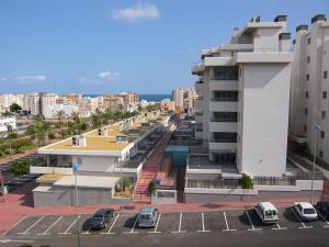 arial view of a parking lot in a city at La Loma in Águilas