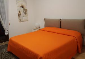 A bed or beds in a room at Sole D'oro IUN S4354
