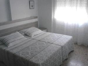 Posteľ alebo postele v izbe v ubytovaní Apartamento Parque playa + 10 fotografií