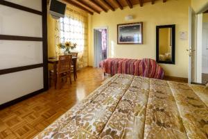 Postel nebo postele na pokoji v ubytování La Fossetta B&B