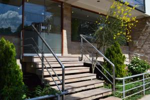 a set of stairs in front of a building at Florida del Inca Hotel in Cusco