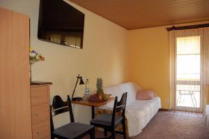 Postel nebo postele na pokoji v ubytování Villa Orchidea