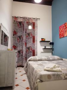 Posteľ alebo postele v izbe v ubytovaní Casa nel Vicolo