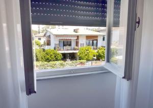 A balcony or terrace at La Coccinella Guest House