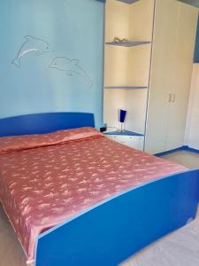 Tempat tidur dalam kamar di Casa al mare con terrazza
