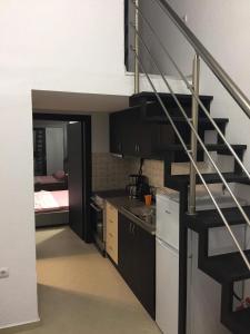 A kitchen or kitchenette at Kriopigi dimis and efis 1