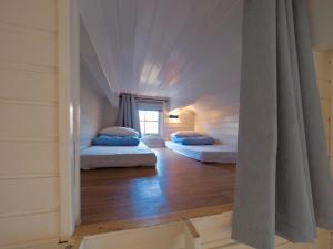 Postel nebo postele na pokoji v ubytování Eagle View Lofoten