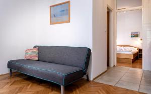Postel nebo postele na pokoji v ubytování Apartmani Nivia