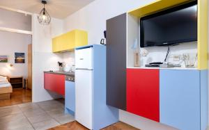 Kuchyň nebo kuchyňský kout v ubytování Apartmani Nivia