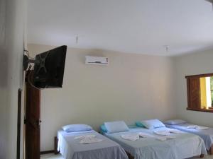 Postel nebo postele na pokoji v ubytování Pousada da Paz