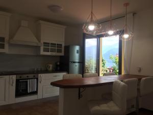 Kuchyň nebo kuchyňský kout v ubytování Luz House + 38 fotografií