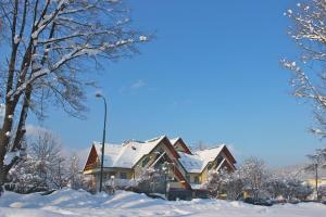 Jawor Pokoje i Apartamenty v zime