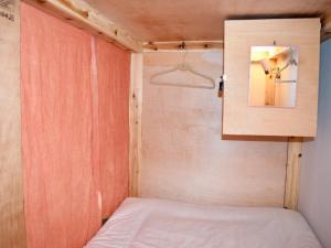 Postel nebo postele na pokoji v ubytování Hiroshima Hostel EN