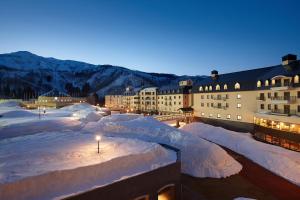 a city covered in snow at night at Lotte Arai Resort in Myoko