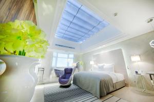 Llit o llits en una habitació de Six Star Motel-Taoyuan