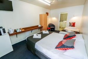 Postel nebo postele na pokoji v ubytování Miriam Vale Motel