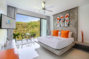 Ένα ή περισσότερα κρεβάτια σε δωμάτιο στο Serenity Villa