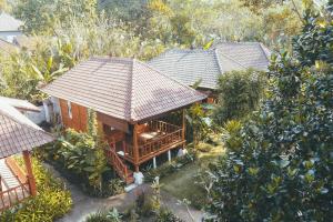 an aerial view of a house with a roof at Kubu Alas Tunggal Villa in Sidemen