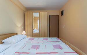 Postel nebo postele na pokoji v ubytování Apartments Rajko