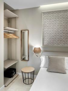 Posteľ alebo postele v izbe v ubytovaní Opera House Valencia B&B