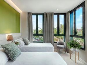 Posteľ alebo postele v izbe v ubytovaní Opera House Valencia B&B