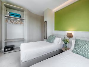 Posteľ alebo postele v izbe v ubytovaní Opera House Valencia B&B