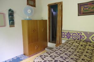 Postel nebo postele na pokoji v ubytování Orchard Huts