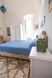 Voodi või voodid majutusasutuse Villa Enea Monopoli toas