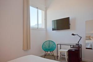 TV a/nebo společenská místnost v ubytování Can Moragues de Soller