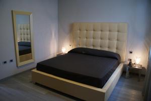 Postel nebo postele na pokoji v ubytování Blue Hotel
