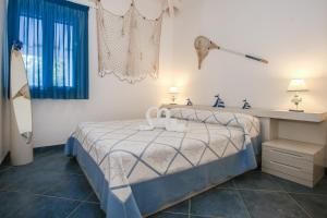 Posteľ alebo postele v izbe v ubytovaní Villa Salina fronte mare