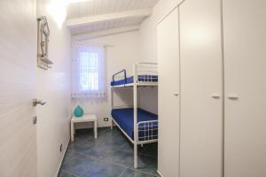 Posteľ alebo postele v izbe v ubytovaní Villa Salina fronte mare
