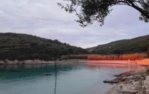 a view of a river with mountains in the background at Resort Village T.N. Milna in Vis