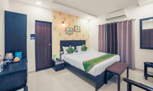 Treebo Chalets, Nagpur Airport客房内的一张或多张床位