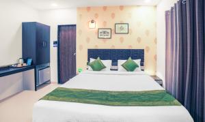 Treebo Chalets, Nagpur Airport客房内的一张或多张床位