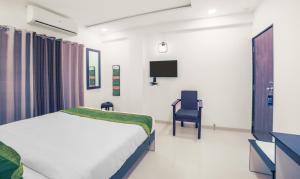 Treebo Chalets, Nagpur Airport的电视和/或娱乐中心