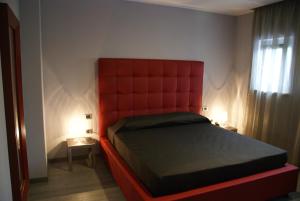 Postel nebo postele na pokoji v ubytování Blue Hotel