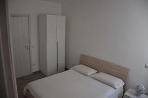 Posteľ alebo postele v izbe v ubytovaní Dimora Santa Caterina + 37 fotografií