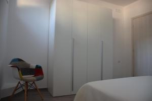 Posteľ alebo postele v izbe v ubytovaní Dimora Santa Caterina