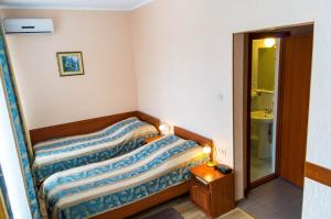 Cama o camas de una habitación en Voyage Hotel Complex